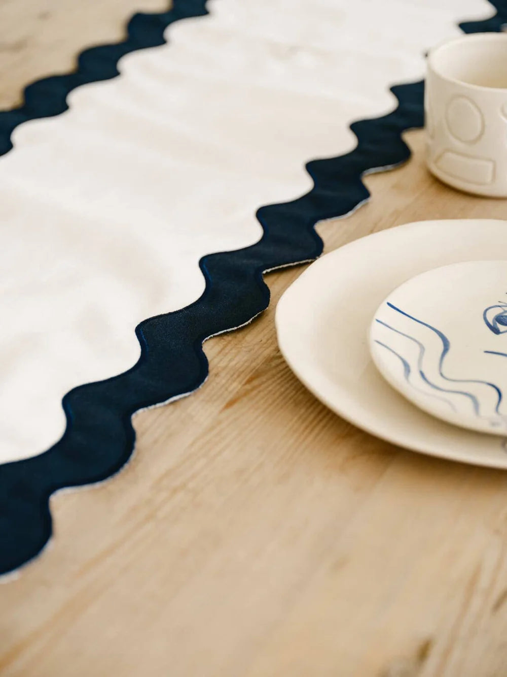 THE TABLE RUNNER - RIVIE WHITE